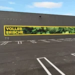 Frontlit-Fassadenbespannung mit Druckmotiv an Firmengebäude